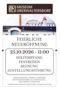 Ein weißes Gebäude mit roten Dächern